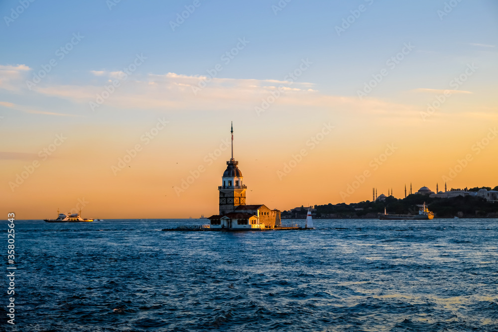 Beautiful sunset over the Maiden’s Tower, Istanbul, Turkey. Eastern travel history city concept