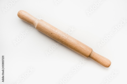 wooden rolling pin, rolling pin for dough, rolling pin on a white background
