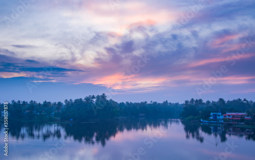 Photo of backwaters in Kerala at sunset  © rahulraju