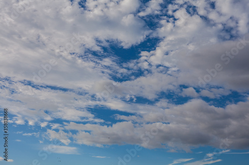 Clouds against the blue sky.