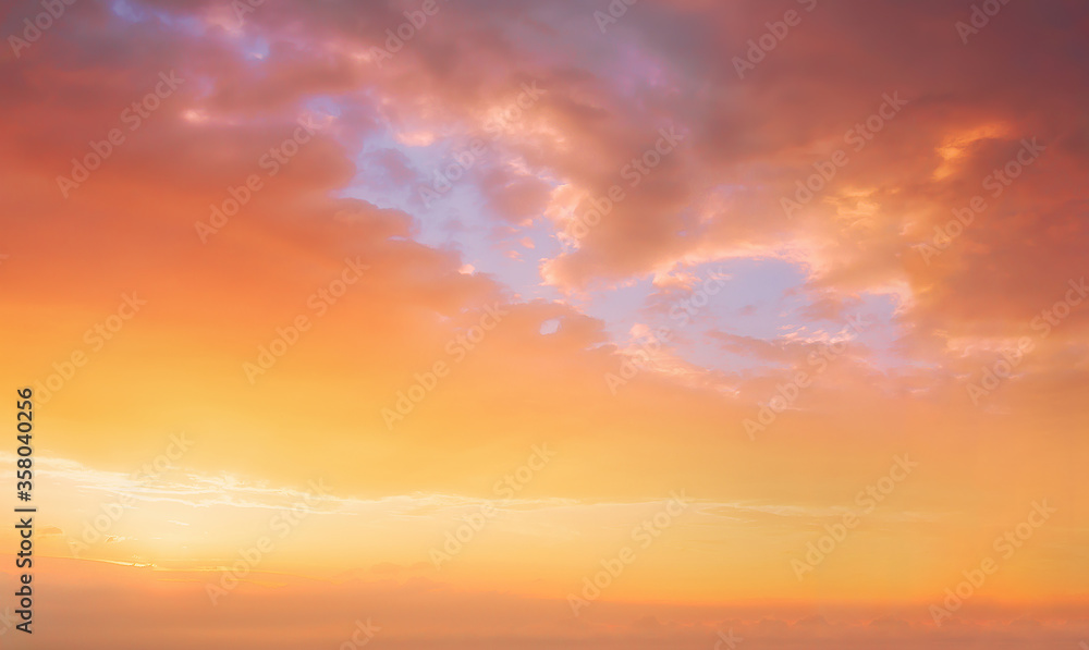 background of cloudscape with beautiful orange sunset clouds on sky