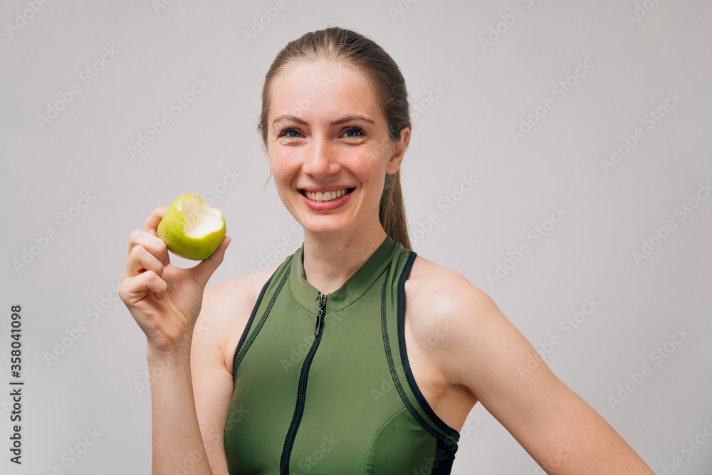 Portrait of smiling young girl with beautiful white teeth. The concept of weight loss, restoration of teeth after braces Portrait of smiling young girl with beautiful white teeth. The concept of weight loss, restoration of teeth after braces