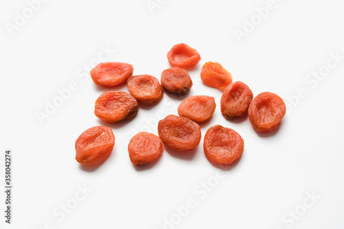 dried apricots on a white background, dried fruits