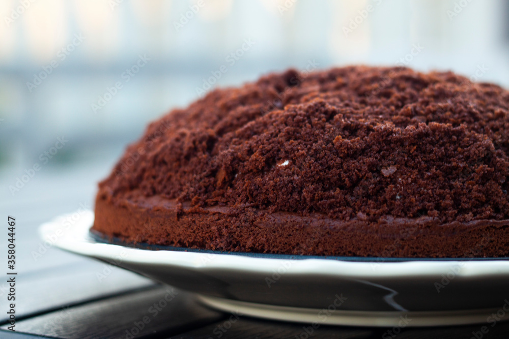 chocolate cake on a white plate chocolate cake on a white plate