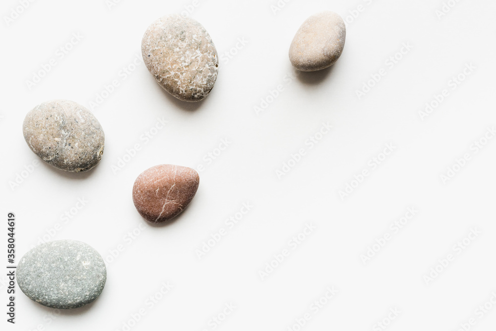 sea stones on a white background, round stones, background of stones sea stones on a white background, round stones, background of stones