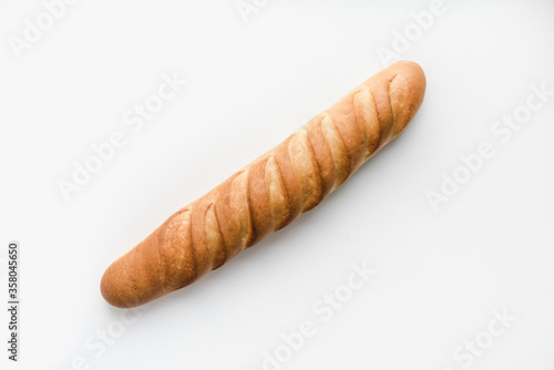 baguette on a white background, sliced ​​long loaf, sliced ​​long loaf on a white background, bakery products