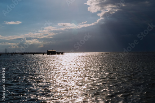 Beautiful summer Scandinavian sundown in Sweden, bridge in backround