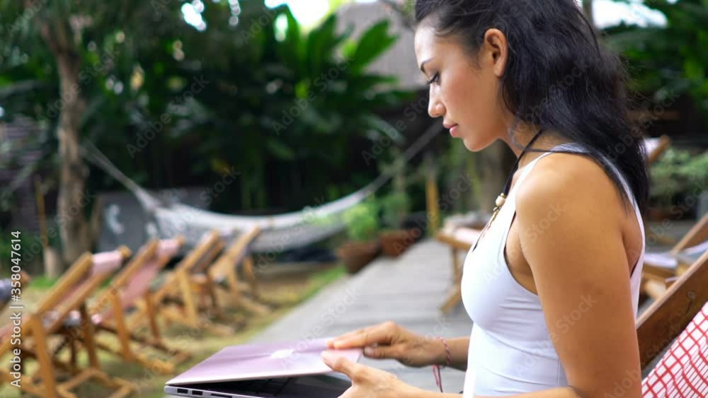 Pretty young woman finish work on laptop and relaxing in city park Pretty young woman finish work on laptop and relaxing in city park
