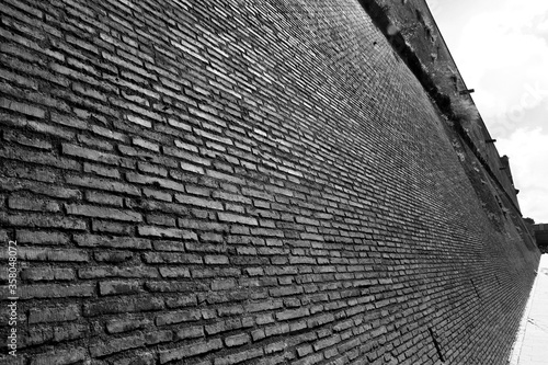 
Wide angle view of the city wall of Vatican City. Black white photo