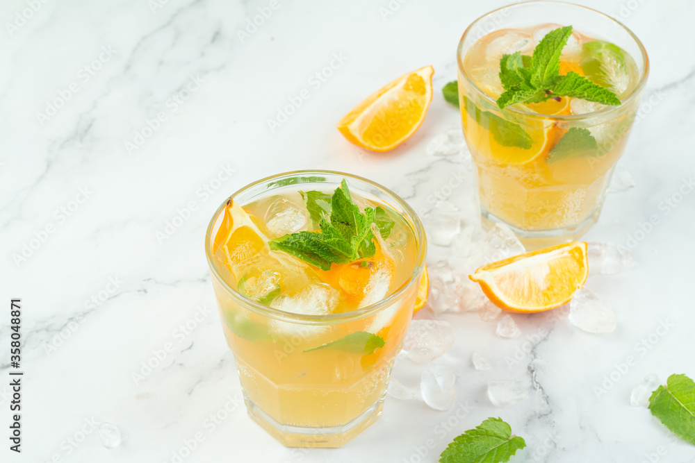 Fototapeta premium lemonade with mint lemon and ice closeup.