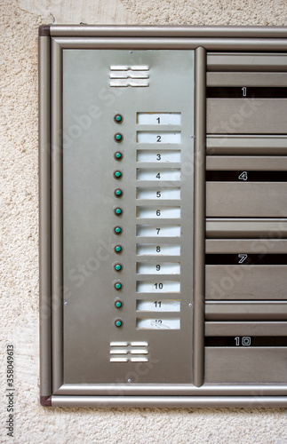 intercom and mailboxes at the entrance to the house close-up