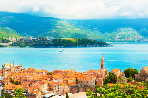 Panoramic view of Old town and sea coast in Budva, Montenegro. Famous resort at Adriatic sea. Beautiful summer landscape.