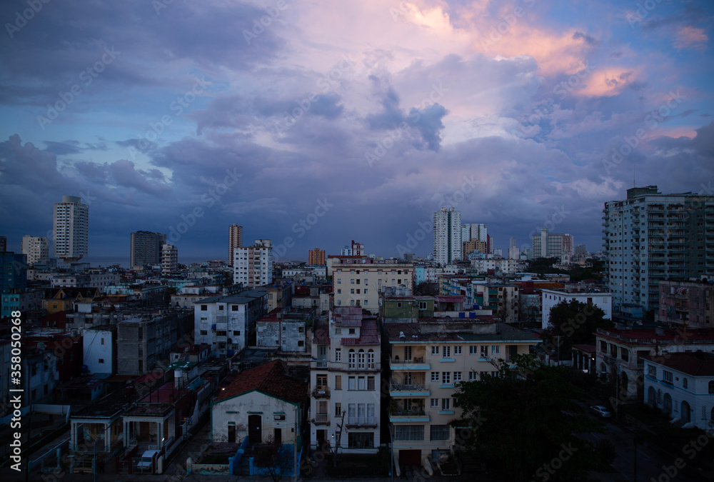 Vedado, La Habana, Cuba - October 13, 2017: incredible views of the city of La Havana in a sunset, evening time. Business and travel context Vedado, La Habana, Cuba - October 13, 2017: incredible views of the city of La Havana in a sunset, evening time. Business and travel context