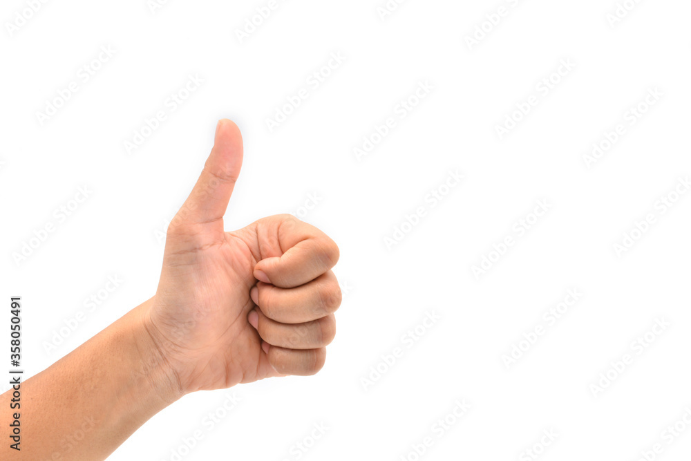 Female hand showing thumb up sign on White Background. Female hand showing thumb up sign on White Background.