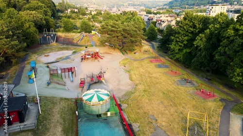 Establishing Aerial of City of Bath Victoria childrens play park, beautiful summer evening, golden hour, slow move backwards 4K photo