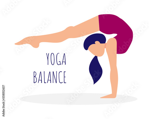 Girl is practicing yoga. Woman doing handstand. Yoga balance.