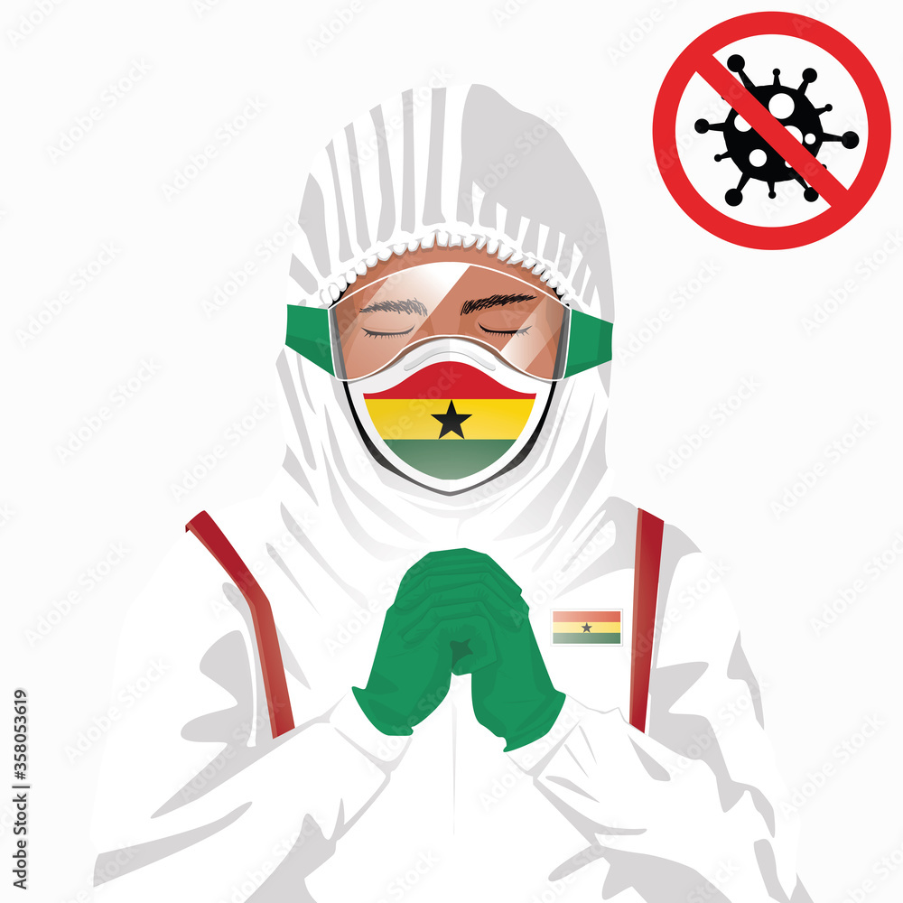 Covid-19 or Coronavirus concept. Ghanaian medical staff wearing mask in protective clothing and praying for against Covid-19 virus outbreak in Ghana. Ghanaian man and Ghana flag. Pandemic corona virus