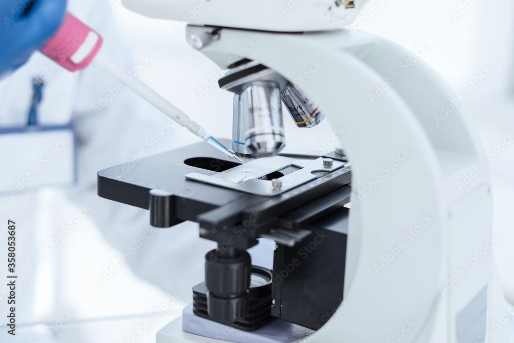 microscope on the table in the biological laboratory.