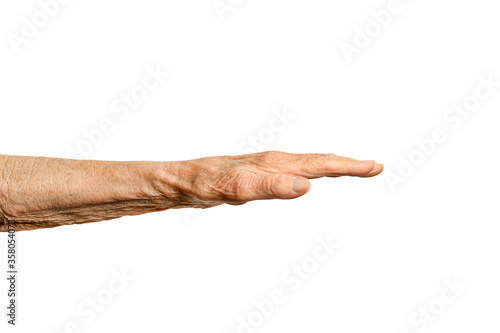 Old senior woman's hand isolated on white background.