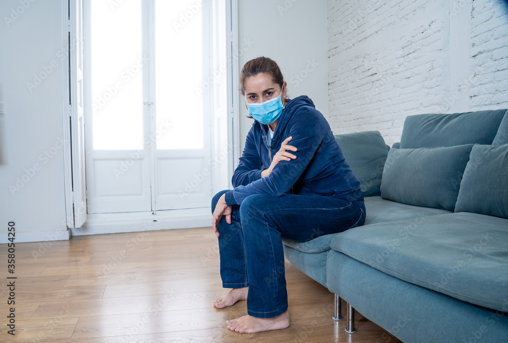 Lonely woman suffering from depression at home during coronavirus lockdown and social distancing Lonely woman suffering from depression at home during coronavirus lockdown and social distancing