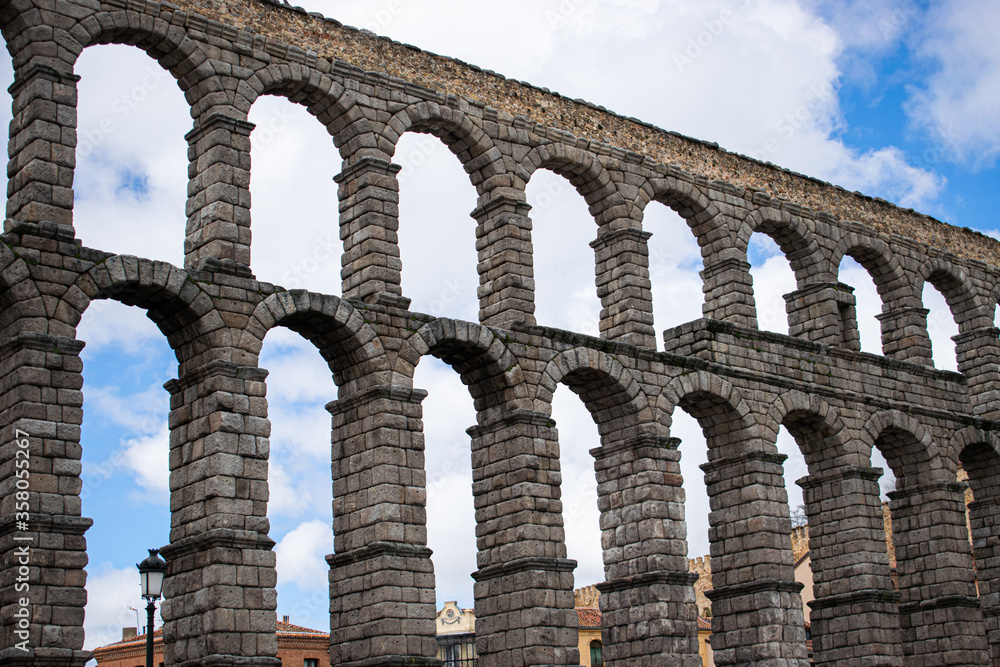 Photo of Segovia aqueduct in Spain during a sunny day