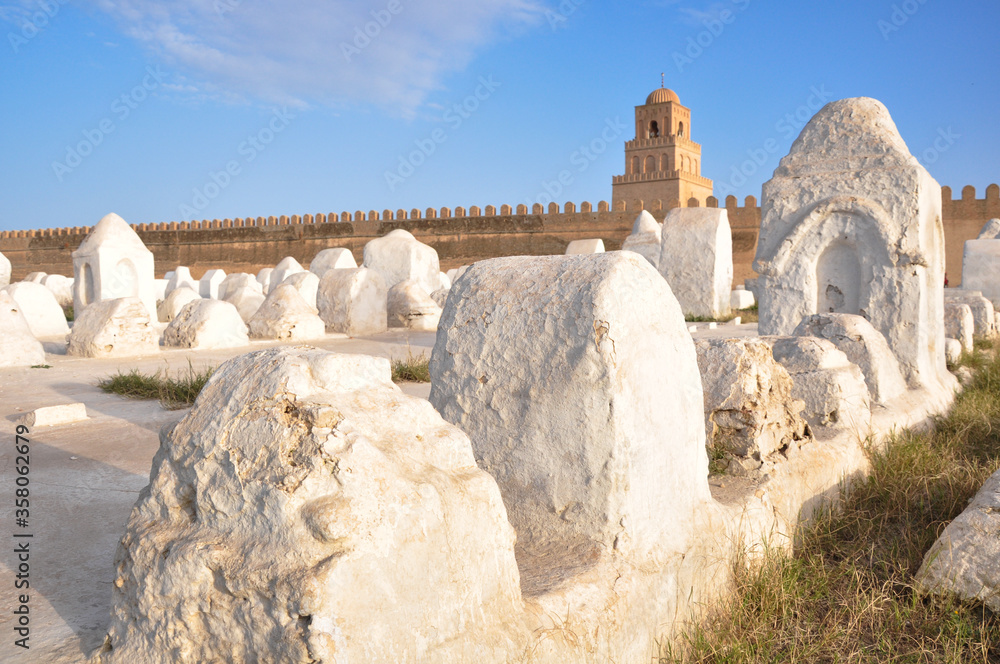 Landscape of the Ouled Farhane Cemetery with the Great Mosque in Kairouan, Tunisia Landscape of the Ouled Farhane Cemetery with the Great Mosque in Kairouan, Tunisia