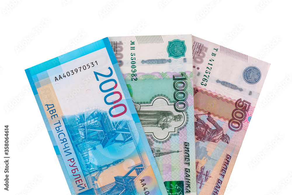 Currency in cash rubles, banknotes nominal 500, 1000, 2000, isolated on white background. Currency in cash rubles, banknotes nominal 500, 1000, 2000, isolated on white background.