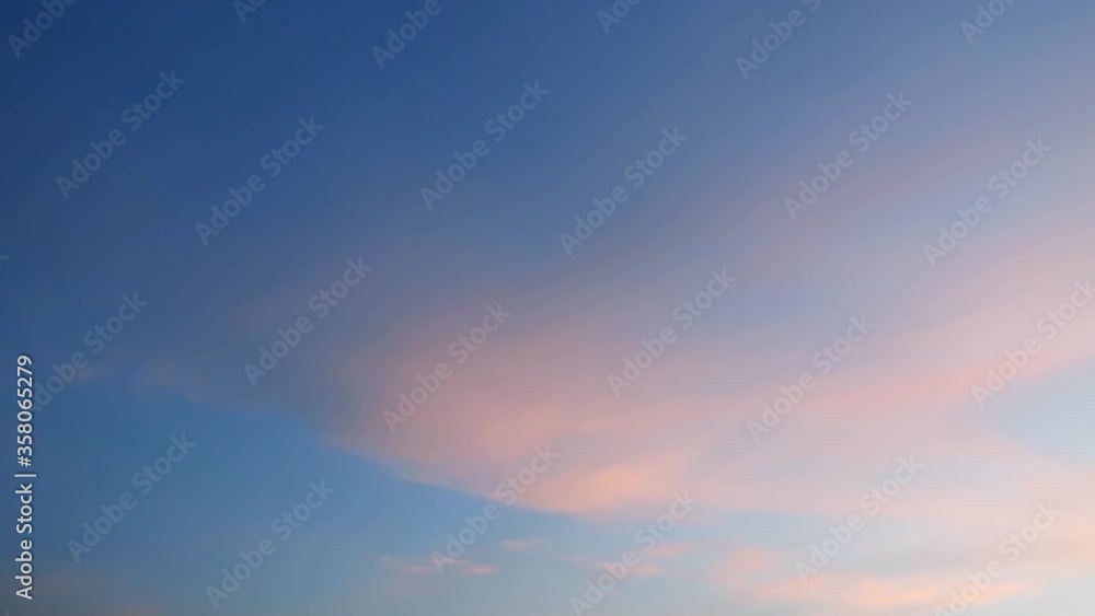 TimeLapse of cirrus clouds turn to Angle wings or free bird formation building with fluffy pink cumulus cloudscape moving on tropical summer morning sunrise or evening twilight sunset horizon TimeLapse of cirrus clouds turn to Angle wings or free bird formation building with fluffy pink cumulus cloudscape moving on tropical summer morning sunrise or evening twilight sunset horizon