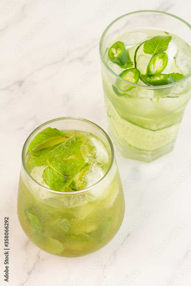 green cocktails with ice and mint. green cocktails with ice and mint.