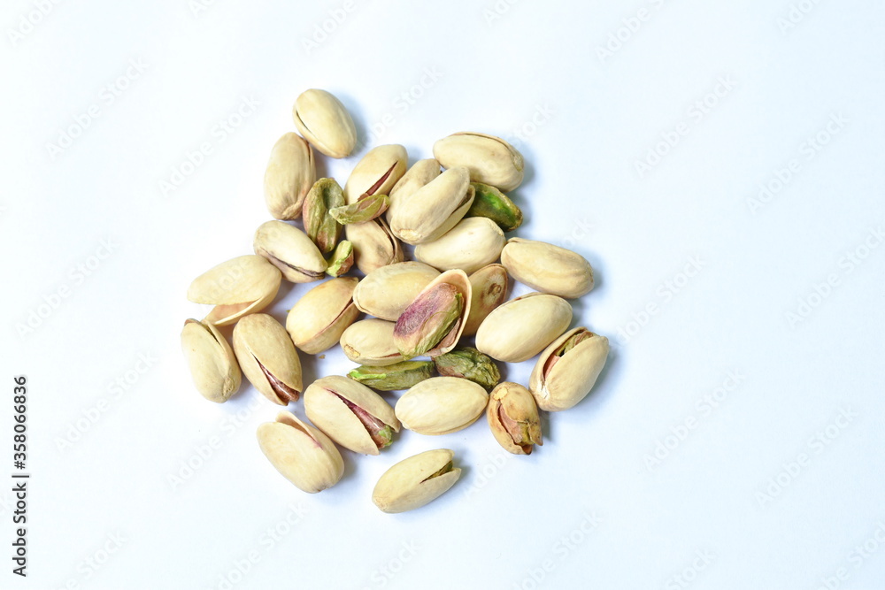 baked salty pistachio nut arranging on white background
