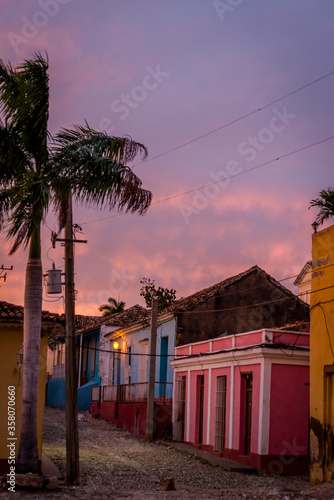 Empty cobblestone street and quaint Spanish style colonial architecture in a residential neighbourhood of the city centre, Trinidad, Cuba © Marina Marr