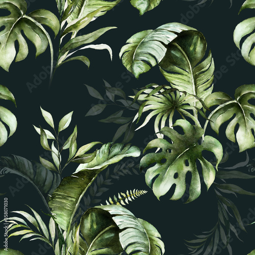 Green tropical leaves on dark background. Watercolor hand painted seamless pa...