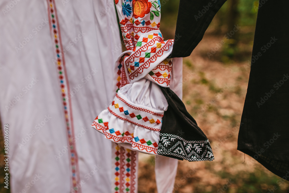 Two traditional embroidered Ukrainian shirts tied with a knot