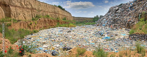 Fotografie Garbage dump pollution, lots of plastic bags, environmental pollution landfill near the city