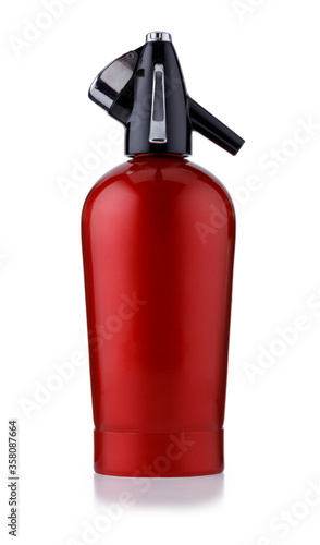 фотографія A retro style red metal soda siphon, isolated on white