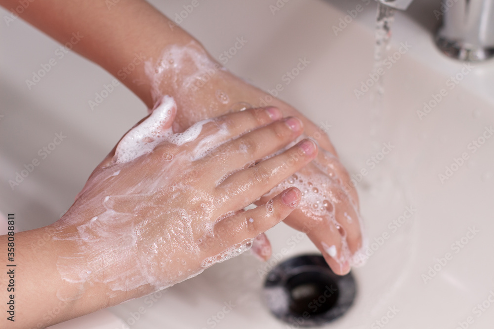 washing hands with soap