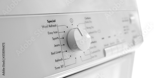 closeup control panel of a tumble dryer