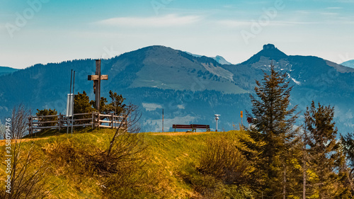 Beautiful alpine spring view with the famous Schlenken and Schmittenstein summits in the background at the Rossfeldstrasse near Berchtesgaden, Bavaria, Germany photo