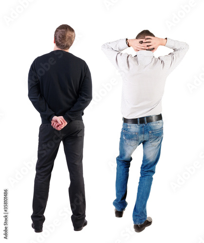 Back view of two business man in suit.