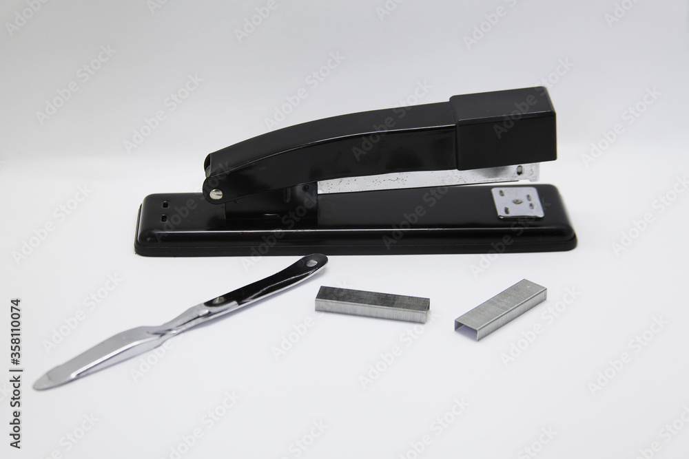 Manual stapler, a tool that allows you to staple a sheet of paper or cardboard through a piece of wire called a staple Manual stapler, a tool that allows you to staple a sheet of paper or cardboard through a piece of wire called a staple