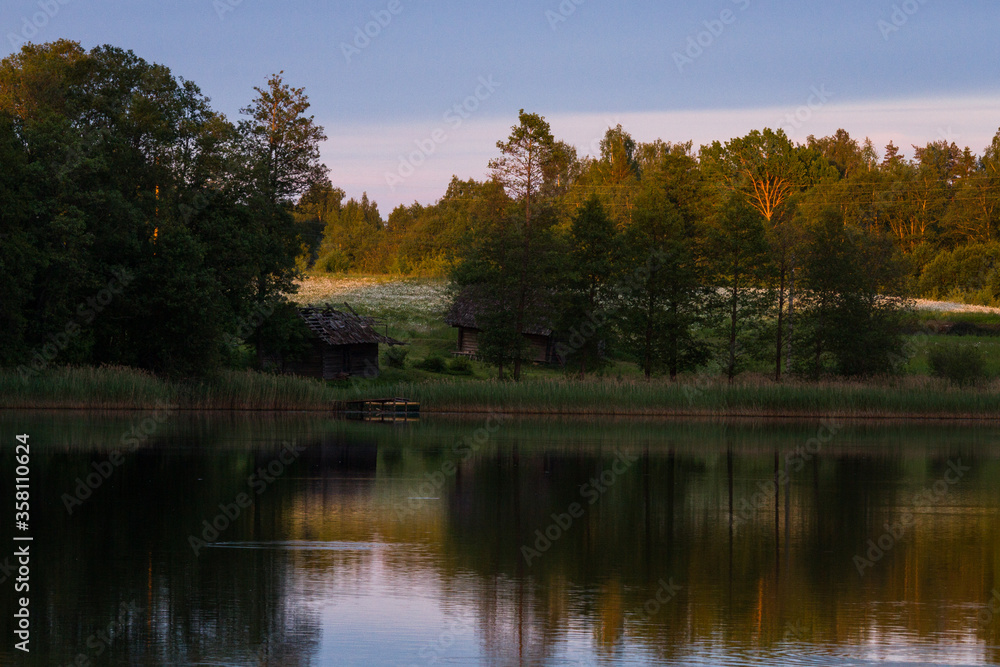 lake shore with fog at sunset lake shore with fog at sunset