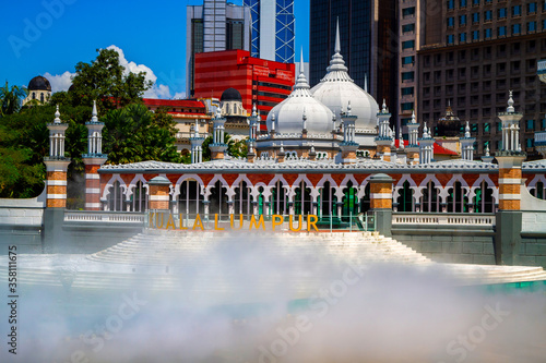 Canvas Print Historic mosque, Masjid Jamek at Kuala Lumpur, Malaysia