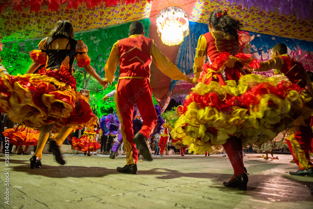 Fototapeta premium Traditional quadrilha dance in the street during the June festivities in Bananeiras, Paraiba, Brazil on June 23, 2015.