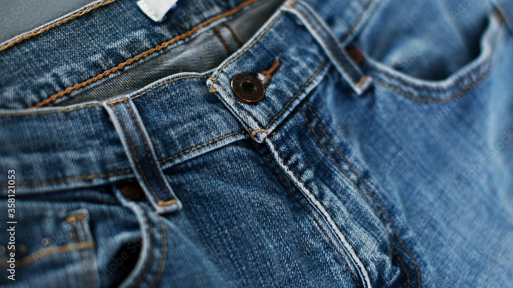 Jeans denim texture close up , focus only one point , soft blured background wallpaper Jeans denim texture close up , focus only one point , soft blured background wallpaper