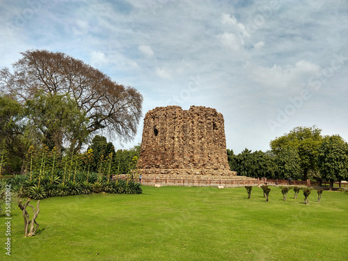 The remains of Alauddin Kilji's Alai Minar at Qutub Minar complex. The unfinished 1-story tower built during the Khalji dynasty to commemorate military victories. photo