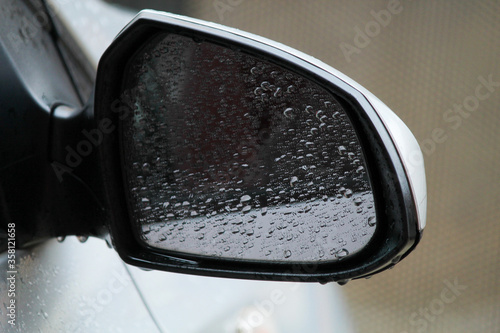 car side mirror wet in rain