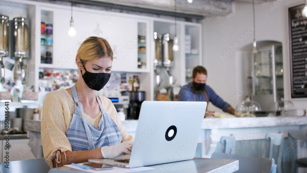 Coffee shop owners with face masks, lockdown, quarantine, coronavirus, back to normal concept. Coffee shop owners with face masks, lockdown, quarantine, coronavirus, back to normal concept.
