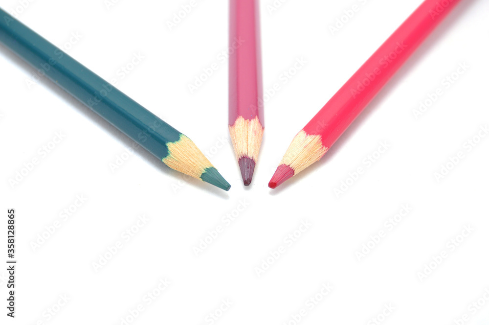 Fototapeta premium Pencils сolored on a white background close up. Drawing, art