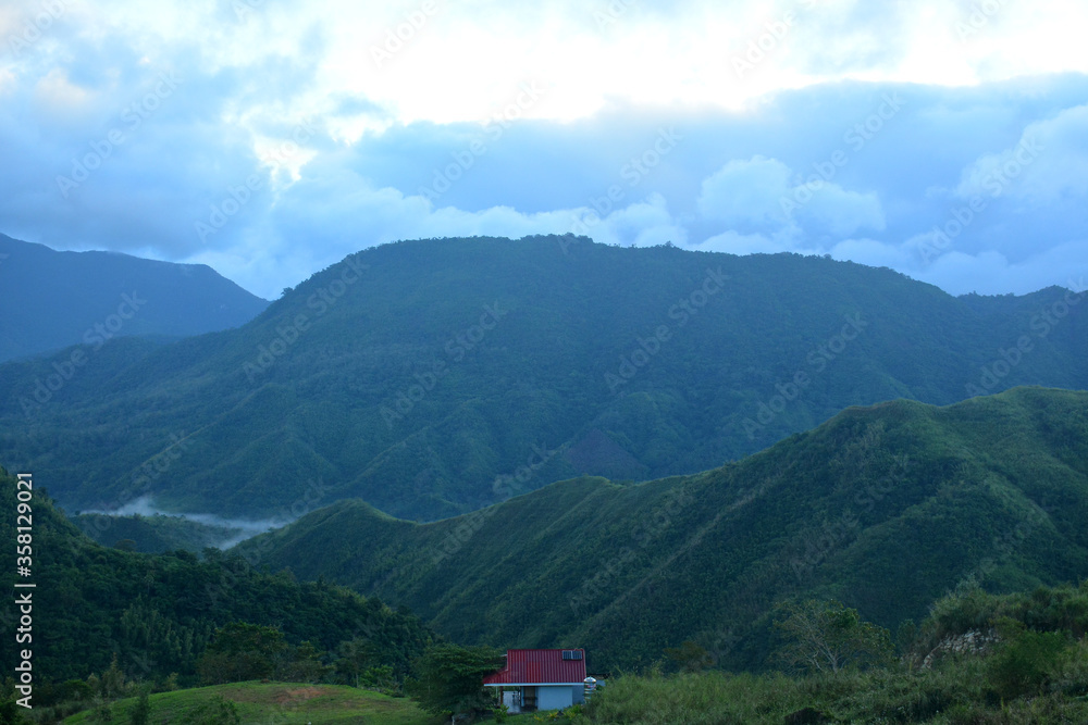 Fototapeta premium Treasure Mountain overview with house in Tanay, Rizal, Philippines