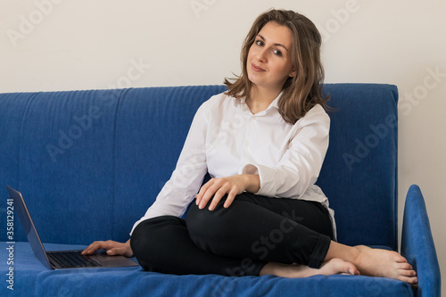 Happy young girl student watch webinar listen online course communicate by conference video call